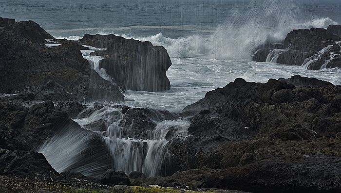 rushing water over rocks in slow motion